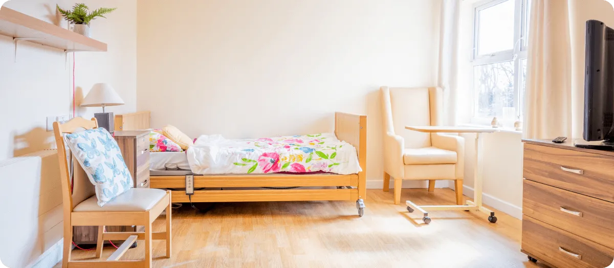 Bright and furnished room at a care home - Applewood Healthcare