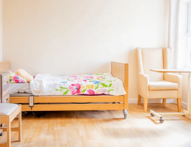 Bright and furnished room at a care home - Applewood Healthcare