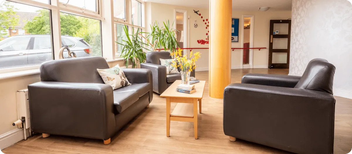 Care home waiting area with sofas - Applewood Healthcare